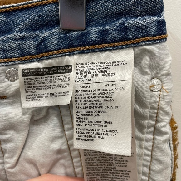 Levi’s 501 Button-Fly Distressed Raw-Hem Denim Shorts Light Wash 29w Festival - Picture 7 of 12